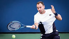 Сафиуллин проиграл Оже-Альяссиму во втором круге US Open